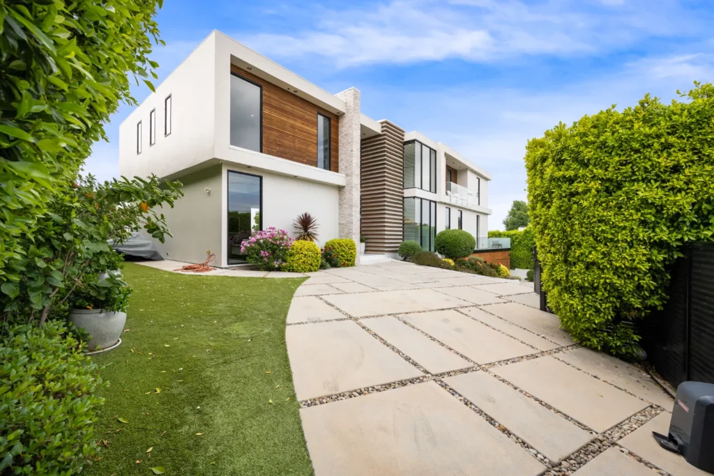 Driveway of a contemporary house with a garden are 2025 02 11 18 47 12 utc